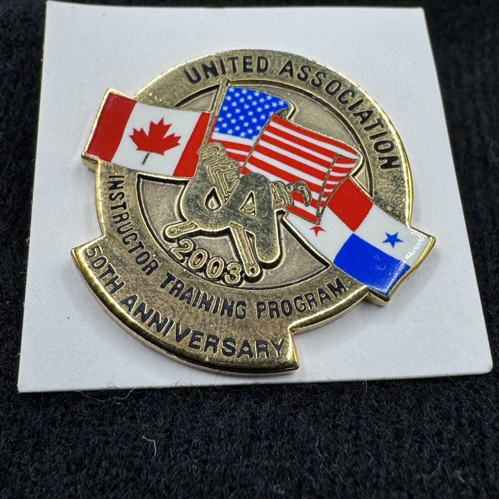 UA Pin PInback Plumbing Pipe Fitting Training 50th Anniversary 2003 Canada USA